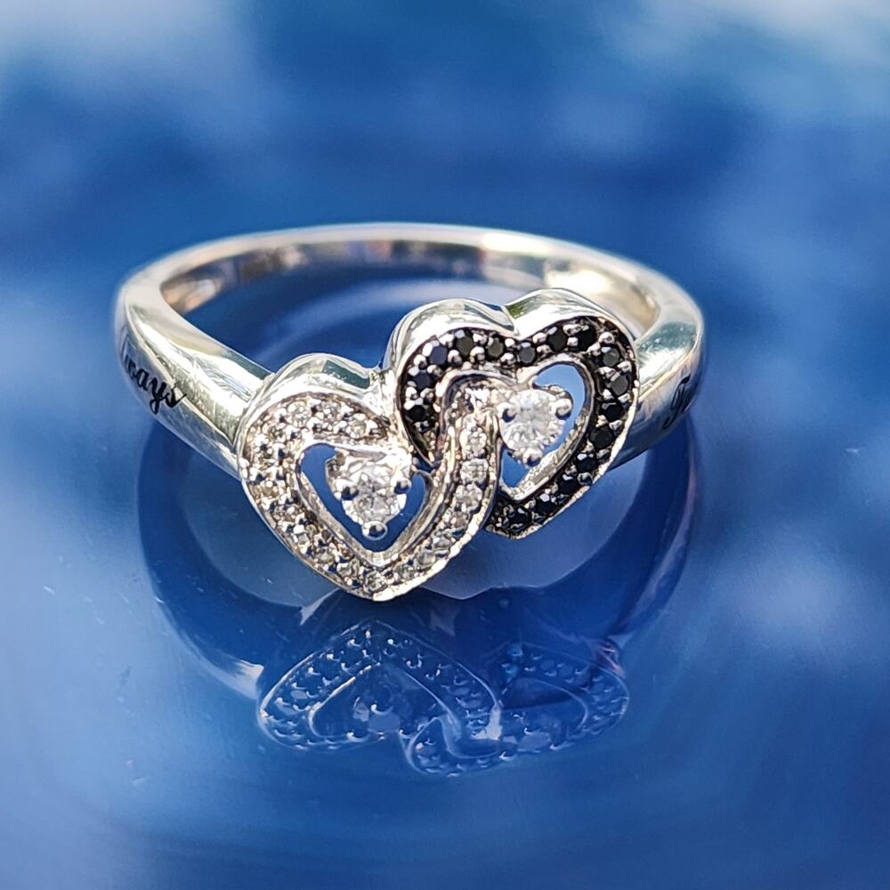 Sterling Silver Enhanced Black White Faux Diamond Multi-Heart Promise Ring